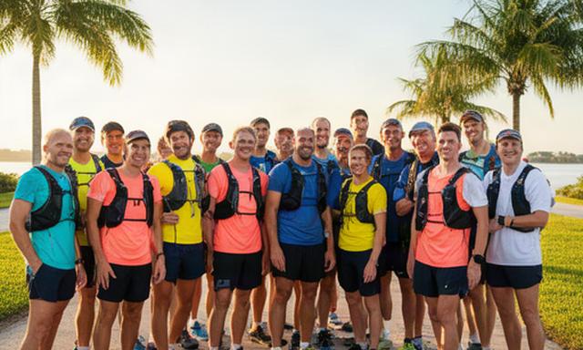 North Palm Beach runners club members carrying hydration packs before a charity 5K
